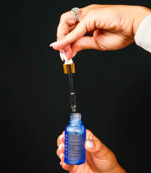 Hyaluronic acid serum bottle drops drips