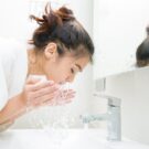 WASHING-FACE-AT-SINK